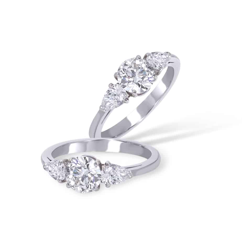 Round and pear shape diamond ring