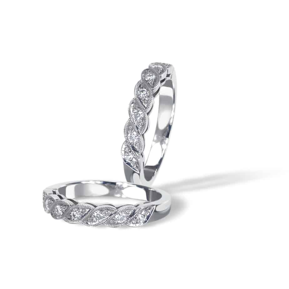 Swirl half eternity ring