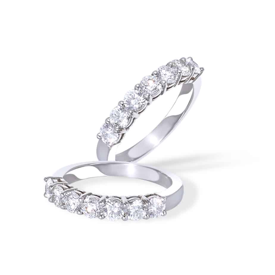 7 stone claw set half eternity ring