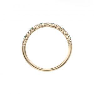 Emerald and diamond cup half eternity ring