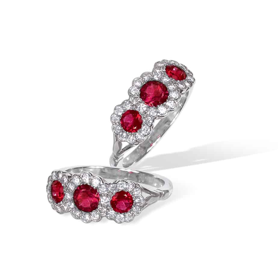 Ruby and diamond round triple cluster ring