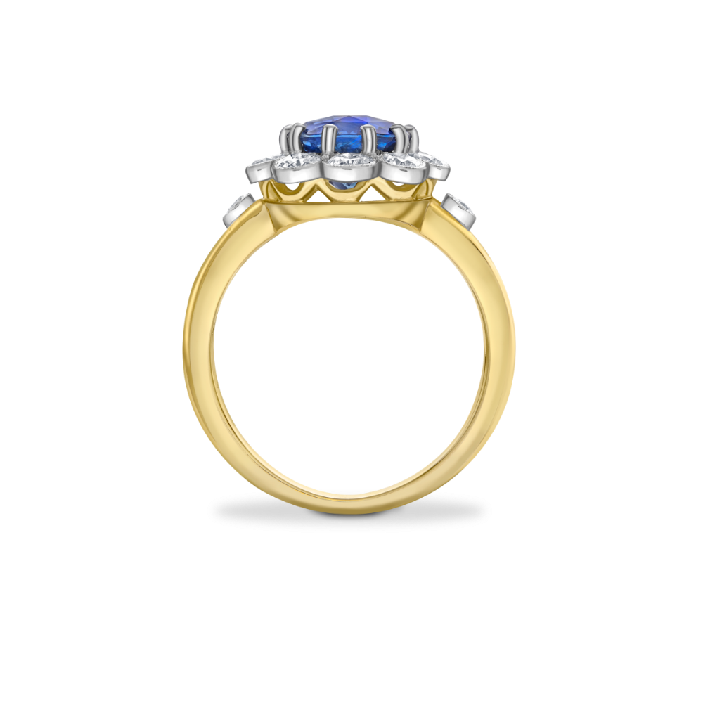 Oval sapphire and diamond cluster ring