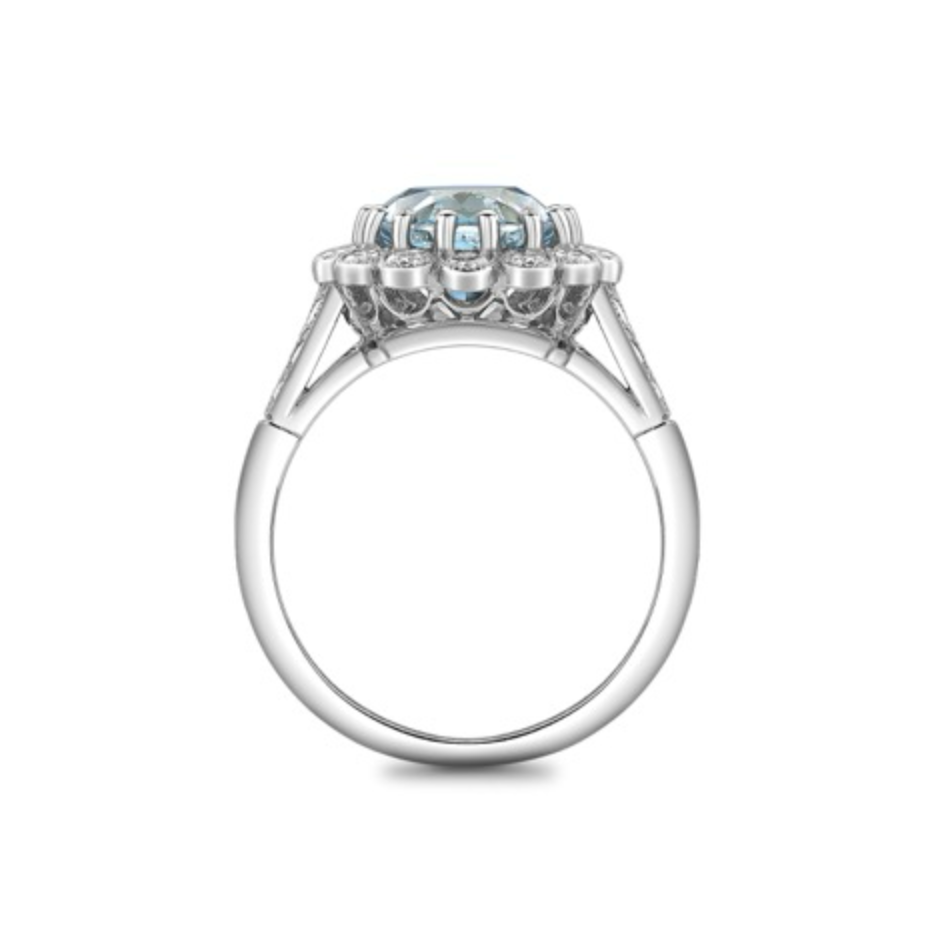 Oval aquamarine and diamond cluster ring