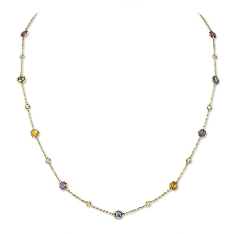 Spectacle set sapphire and diamond pendant