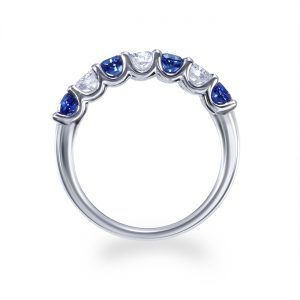 Sapphire and diamond claw set half eternity ring