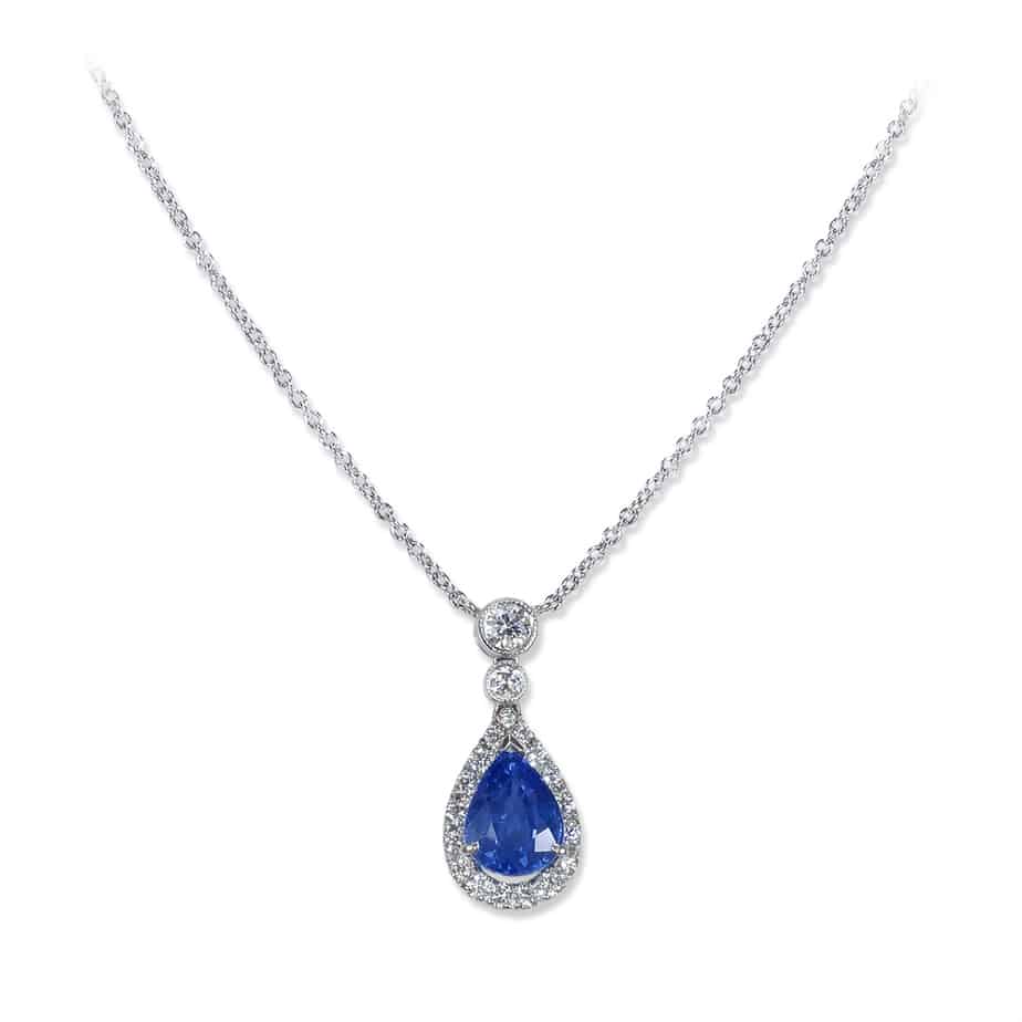 Pear shape sapphire and microset diamond pendant