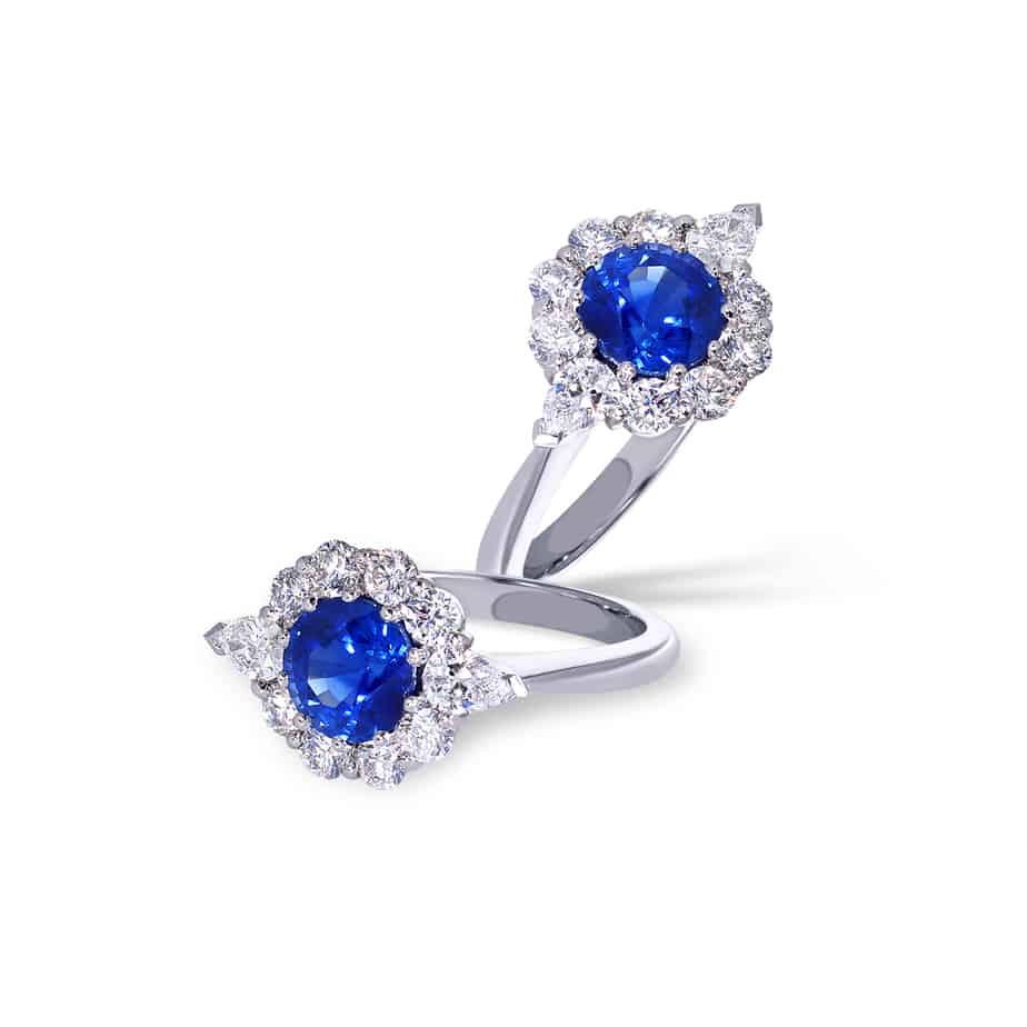 Round sapphire & diamond cluster ring