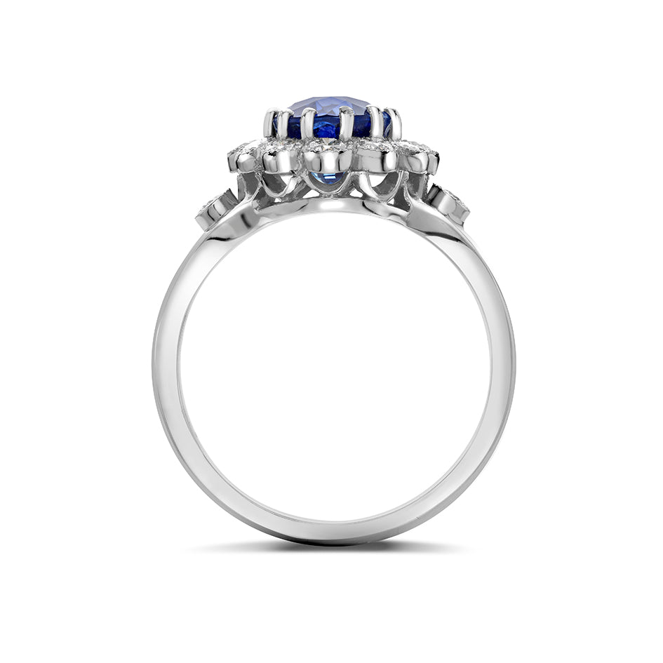 Oval sapphire and diamond cluster ring