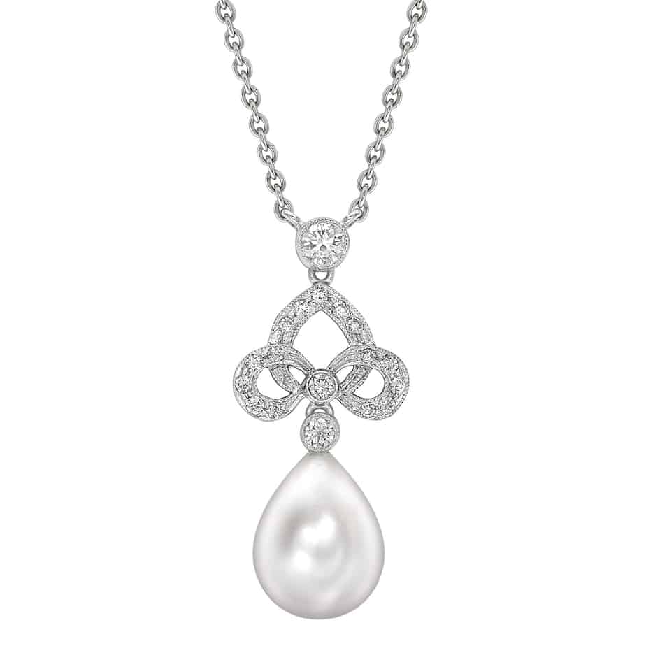 Bow top pearl & diamond pendant