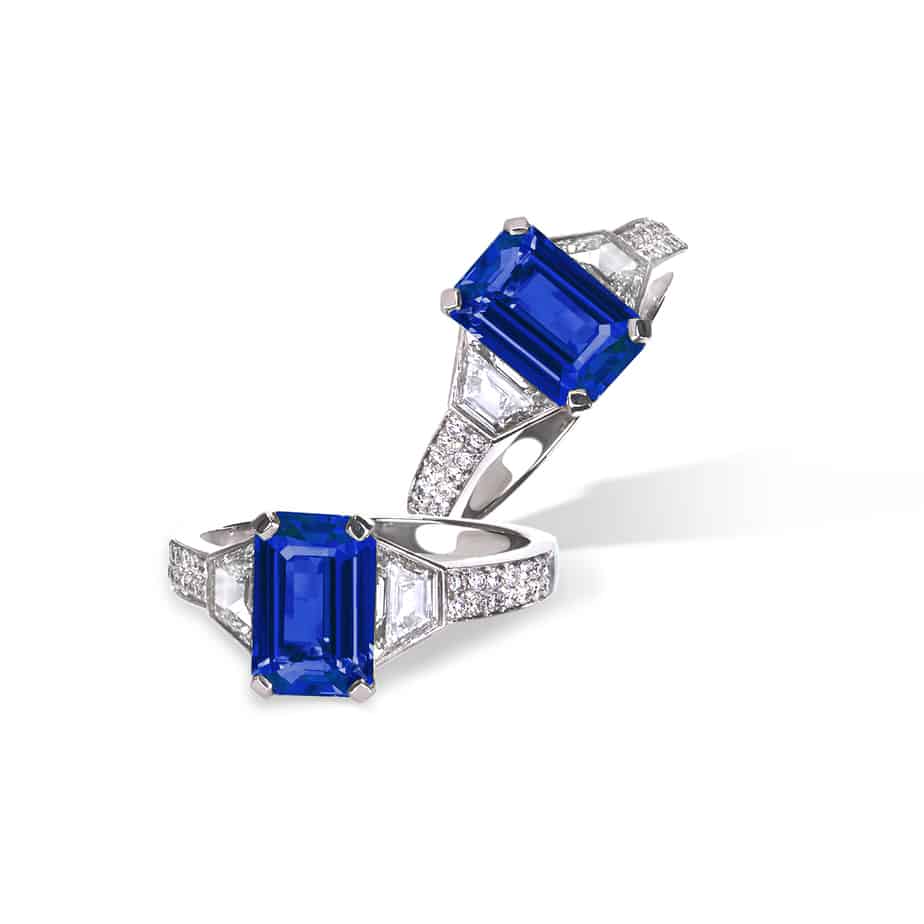 Emerald cut sapphire and trapeze diamond 3 stone ring