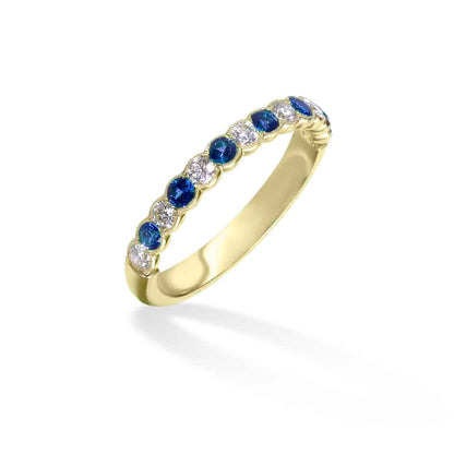 Sapphire and diamond cup half eternity ring
