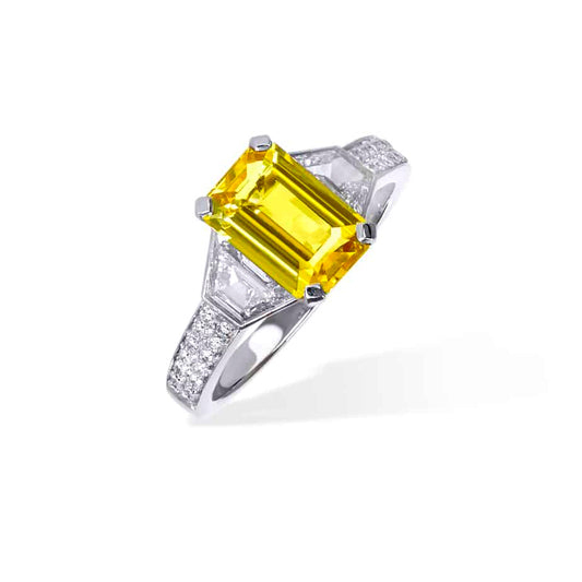 Emerald cut yellow sapphire and trapeze cut diamond 3 stone ring