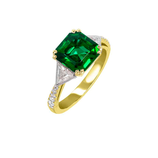 Octagon emerald and trillion diamond ring