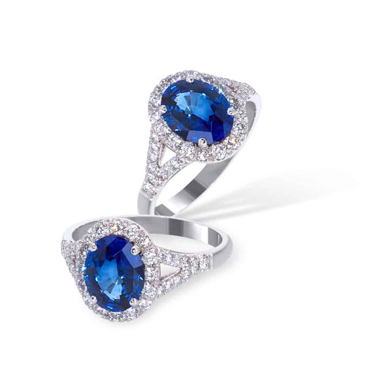 Oval sapphire and diamond split shank cluster ring