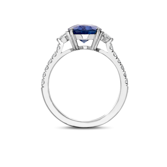 Oval sapphire and half moon diamond ring