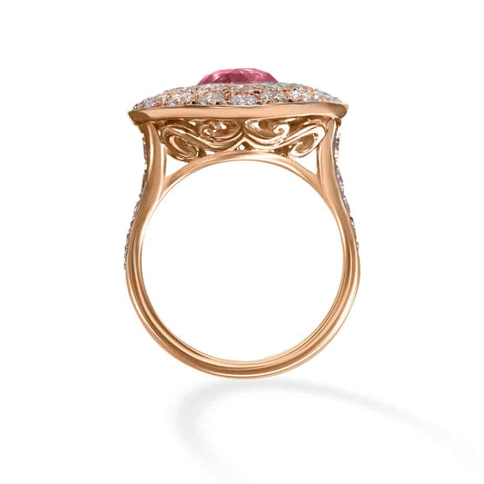 Cushion cut Padparadshca Sapphire and diamond bombe ring