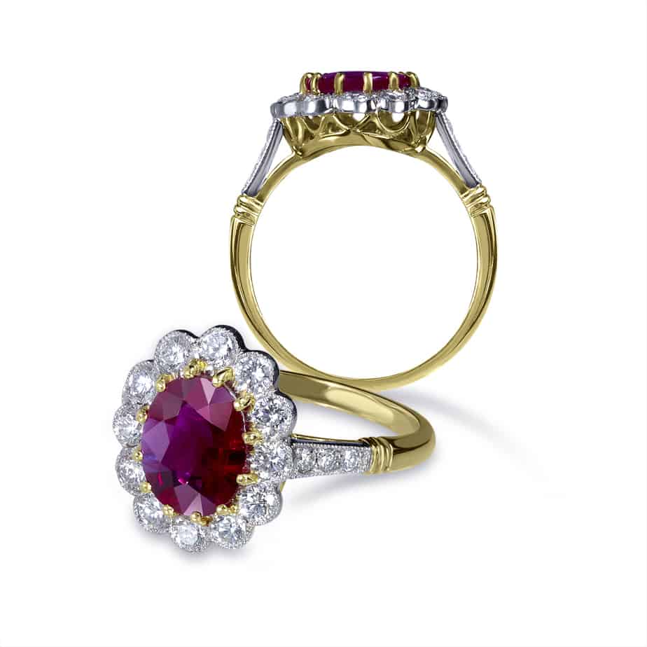Oval ruby and diamond cluster ring