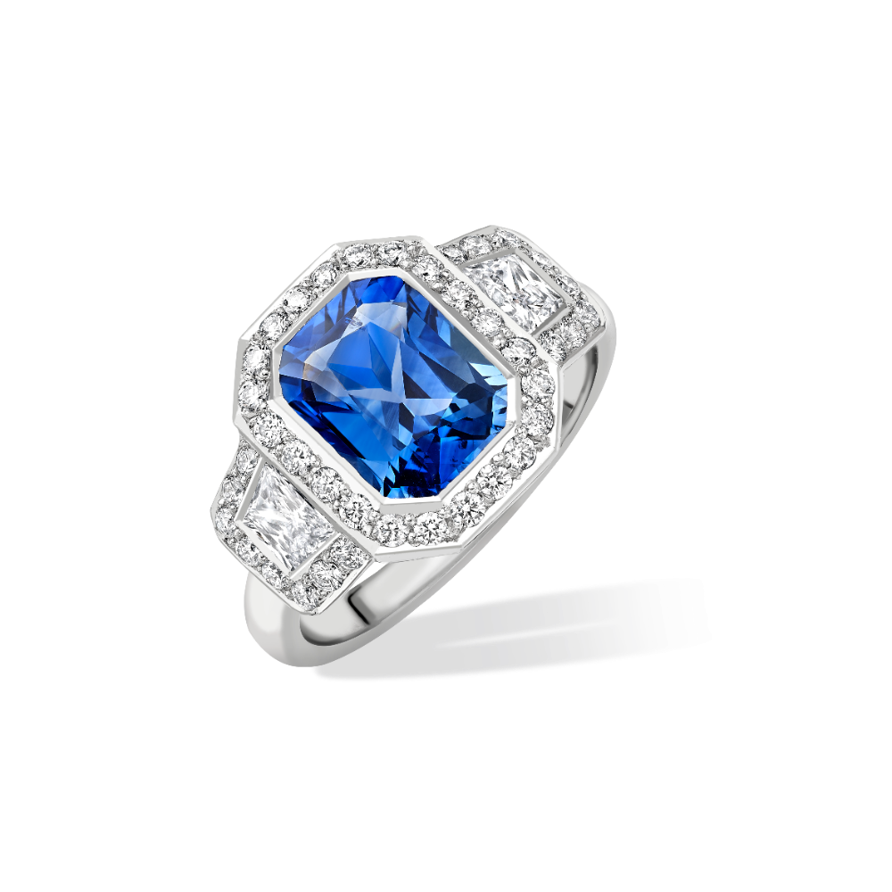 Radiant cut sapphire and trapeze diamond cluster ring