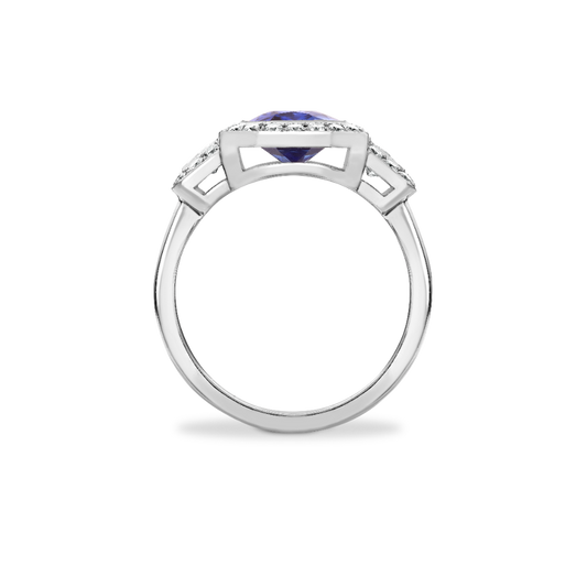 Radiant cut sapphire and trapeze diamond cluster ring