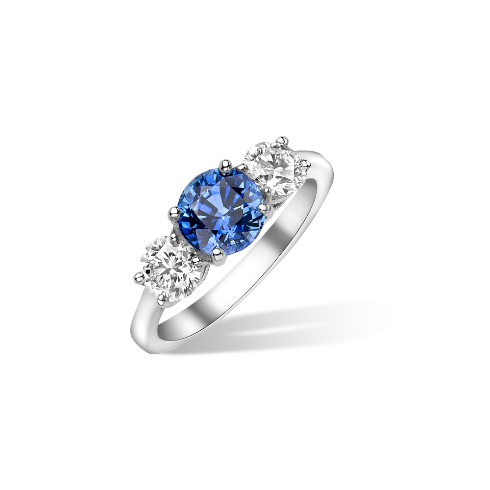 Round blue sapphire and diamond ring