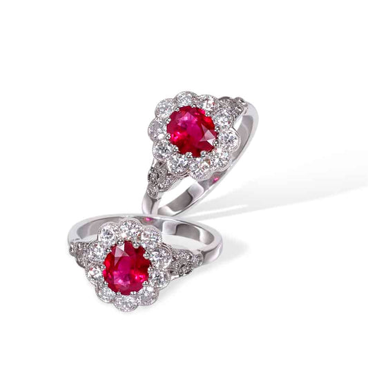 Oval ruby and diamond trefoil cluster ring