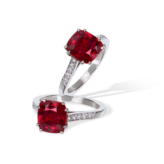Cushion cut ruby and diamond single stone ring