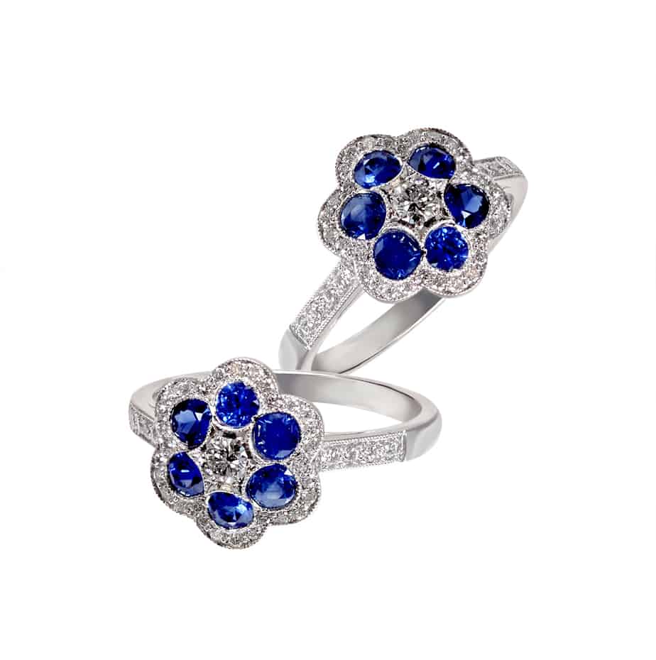 Round sapphire and diamond 6×1 cluster ring