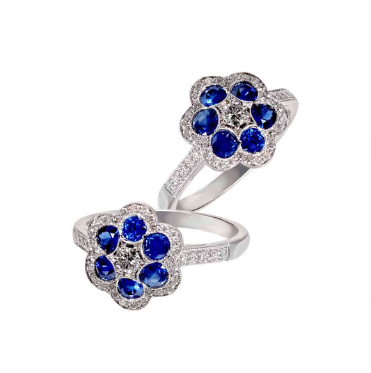 Round sapphire and diamond 6×1 cluster ring