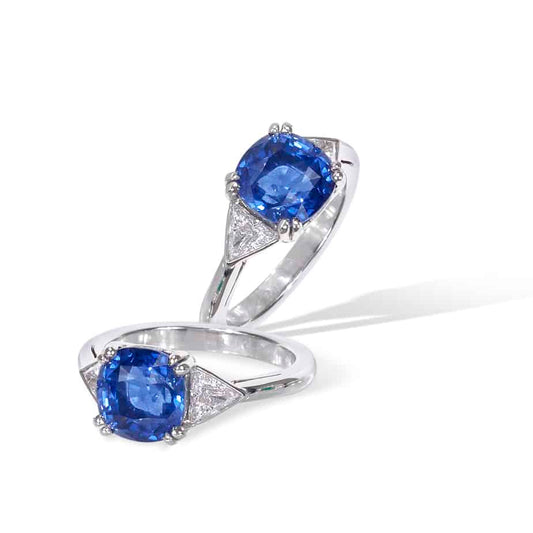 Small cushion sapphire and trillion diamond 3 stone ring