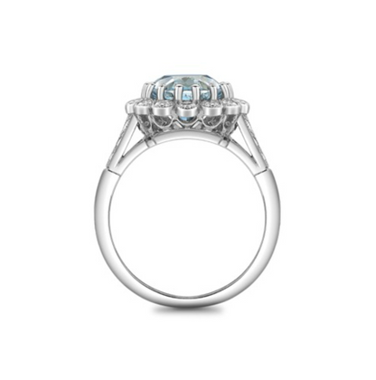 Oval aquamarine and diamond cluster ring