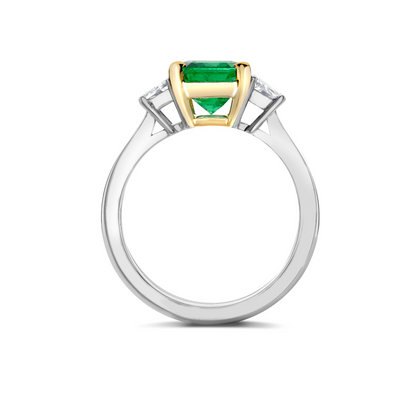 Octagon emerald and trapeze diamond 3 stone ring