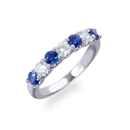 Sapphire and diamond claw set half eternity ring