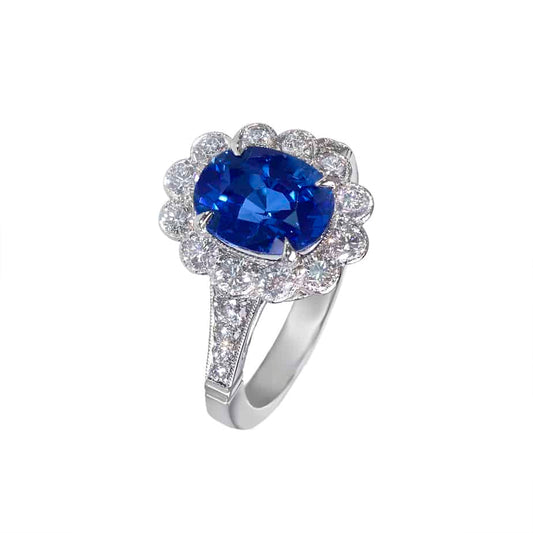Oval sapphire & diamond cluster ring