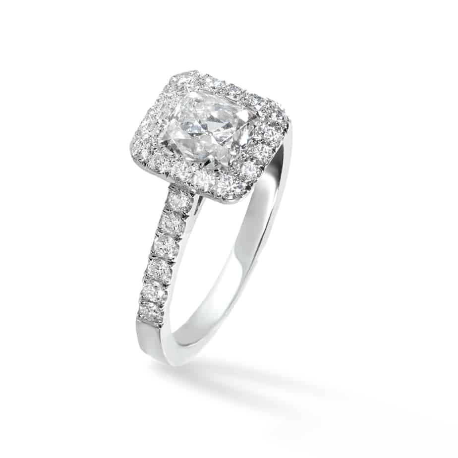 Cushion cut diamond cluster ring with grained in centre