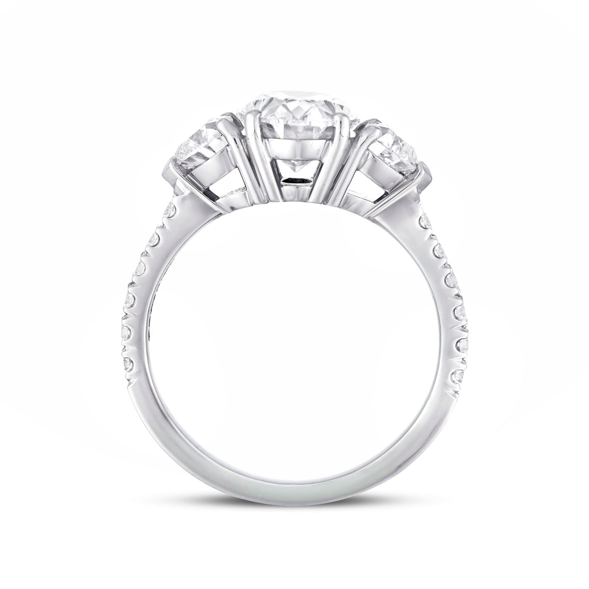 Oval and heart shape diamond three stone ring with microset diamond shank in platinum, side view