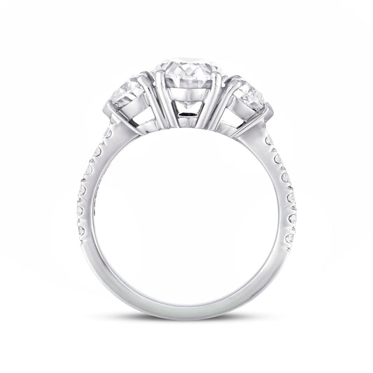 Oval and heart shape diamond three stone ring with microset diamond shank in platinum, side view