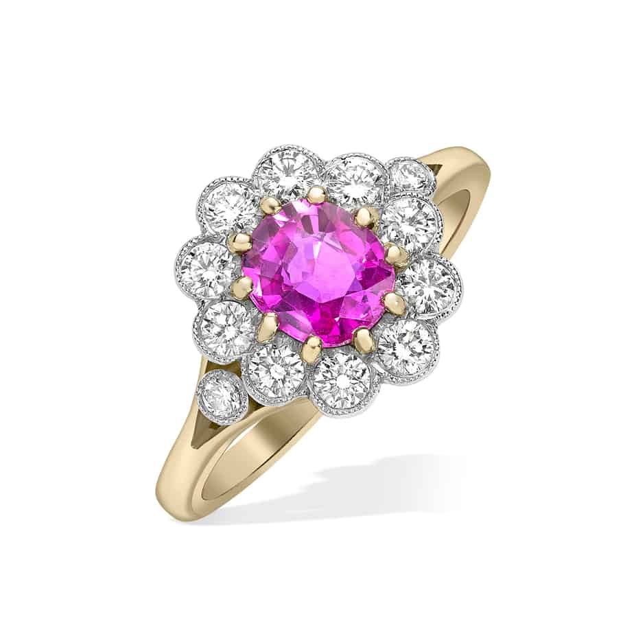 Oval pink sapphire and diamond cluster ring