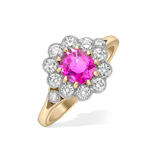 Oval pink sapphire and diamond cluster ring