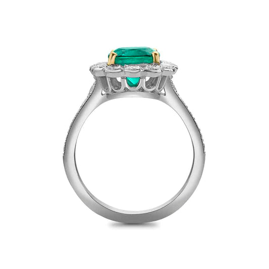 Cushion cut emerald and diamond cluster ring